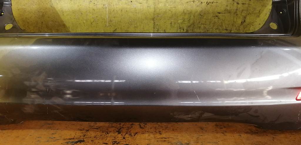 бампер Nissan Note