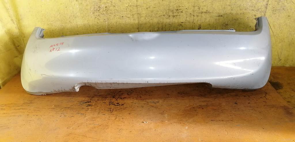 бампер Nissan March