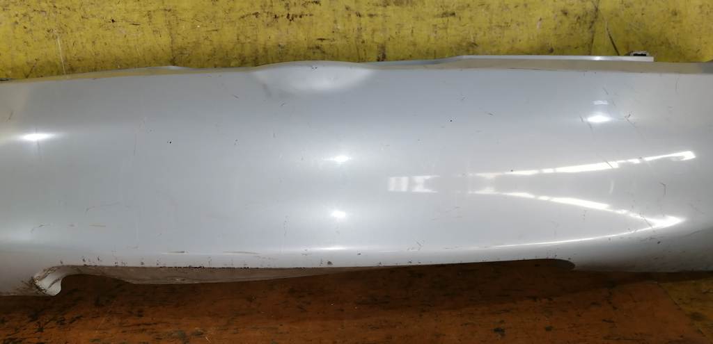 бампер Nissan March