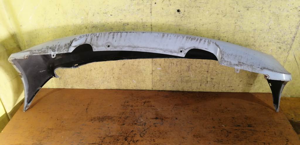 бампер Nissan March