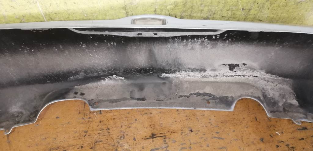 бампер Nissan March