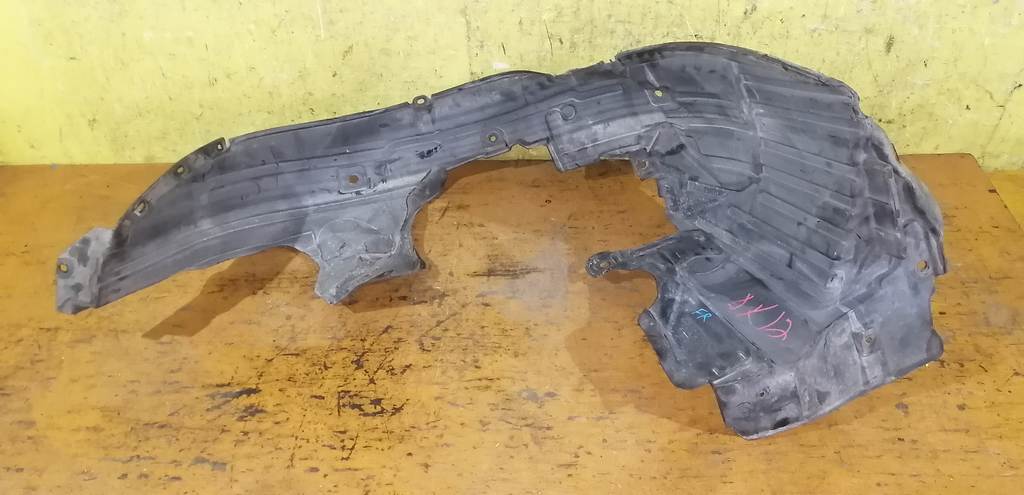 подкрылок Nissan March