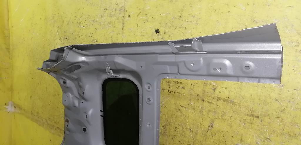 крыло Mazda Demio