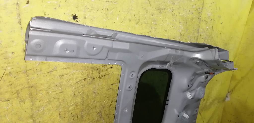 крыло Mazda Demio