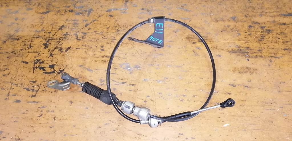 трос переключения акпп Nissan Note