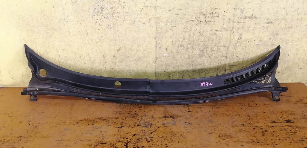 жабо Mazda Demio