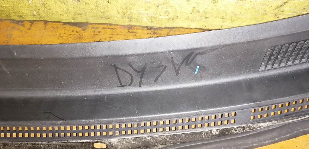 жабо Mazda Demio