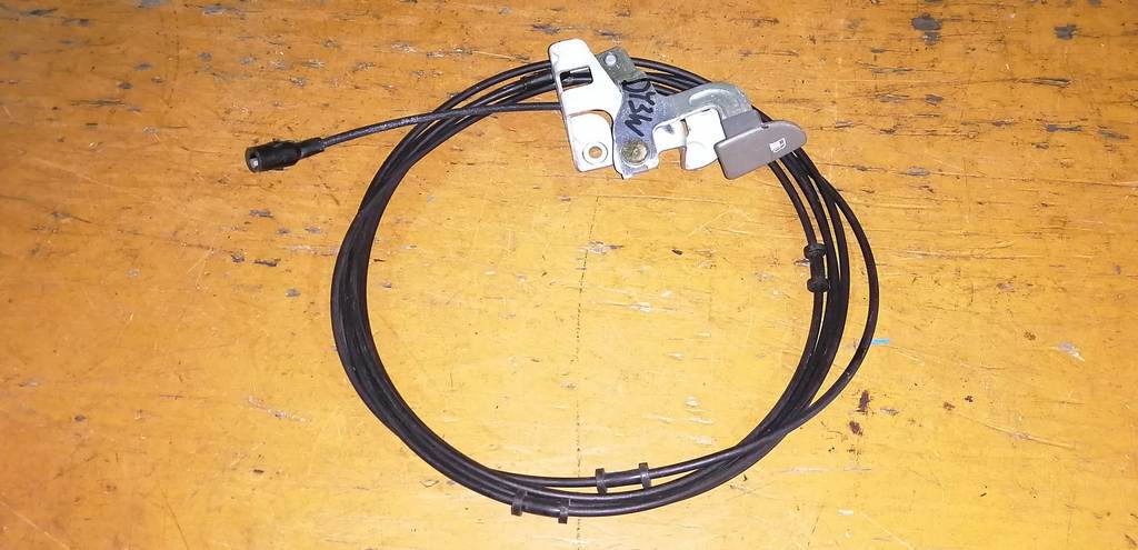 тросик лючка бака Mazda Demio