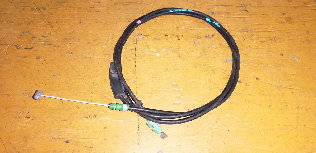 трос капота Nissan Cube