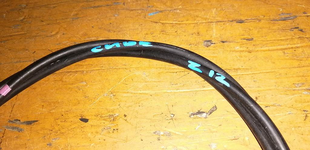 трос капота Nissan Cube