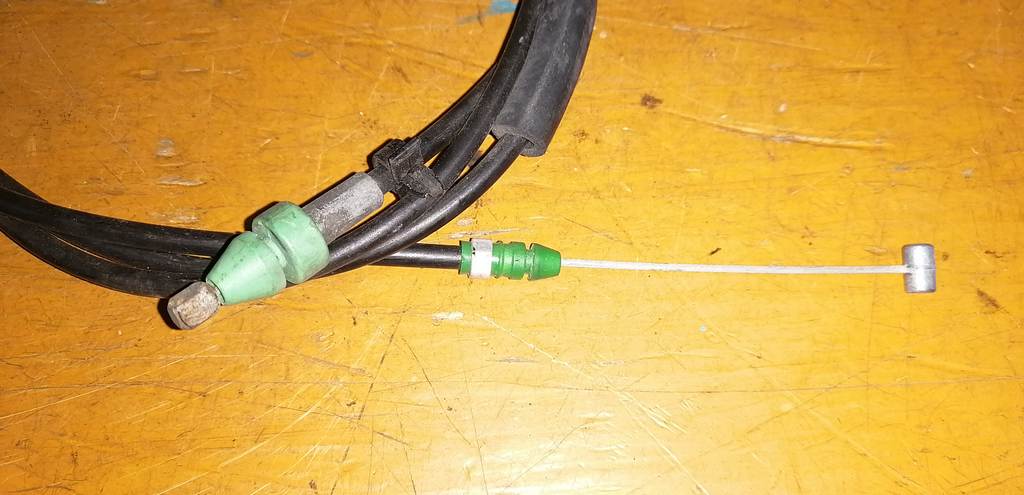 трос капота Nissan Cube