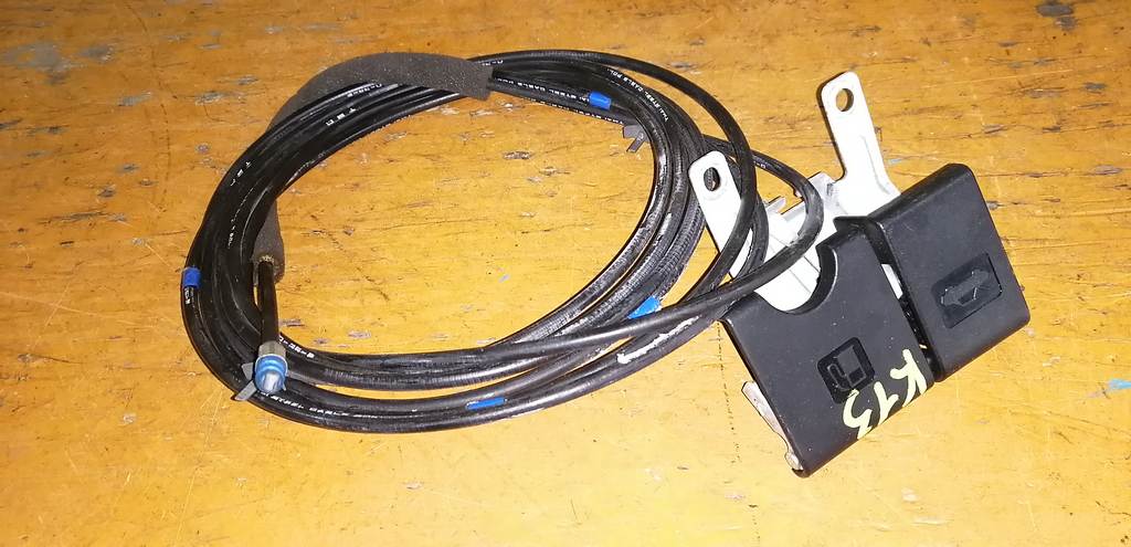 тросик лючка бака Nissan March