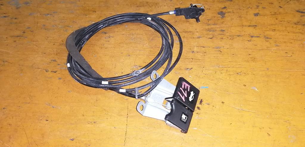 тросик лючка бака Nissan Note