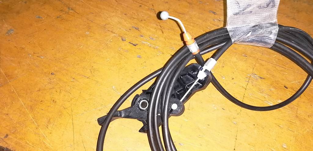 тросик лючка бака Toyota Passo