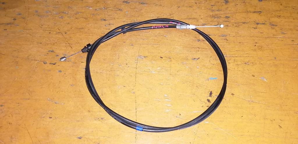 трос капота Nissan March