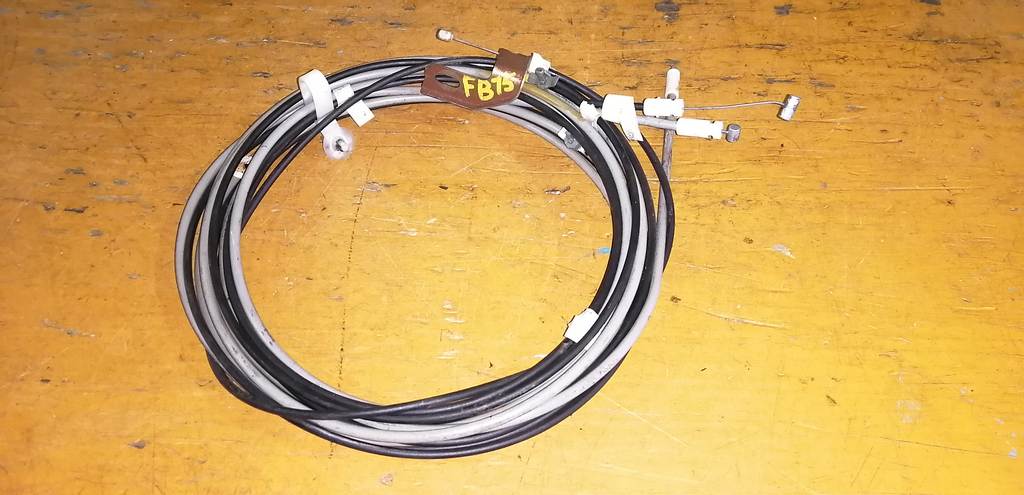 тросик багажника Nissan Sunny