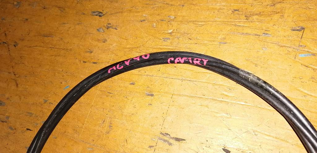 трос капота Toyota Camry