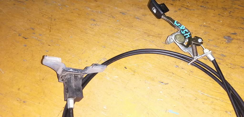 тросик лючка бака Mitsubishi Pajero Mini