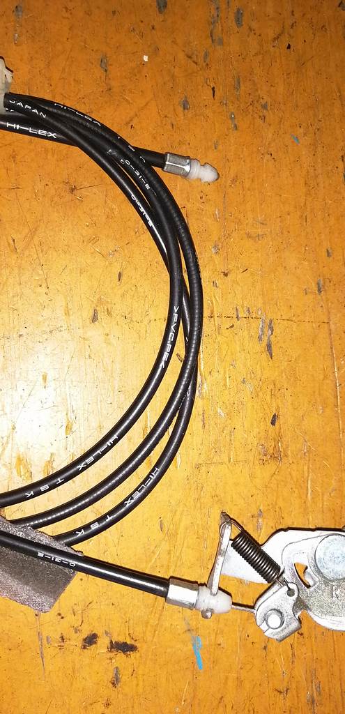 тросик лючка бака Mitsubishi Pajero Mini