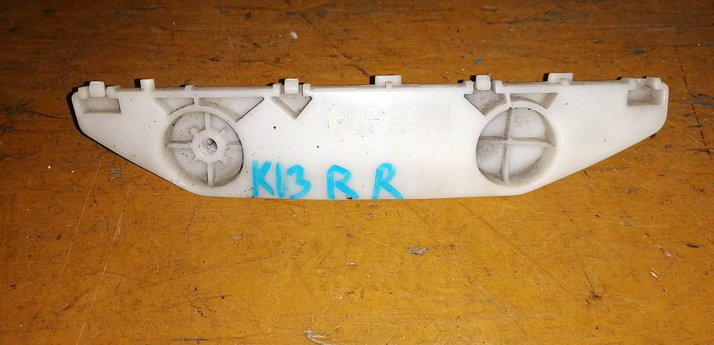 крепеж бампера Nissan March