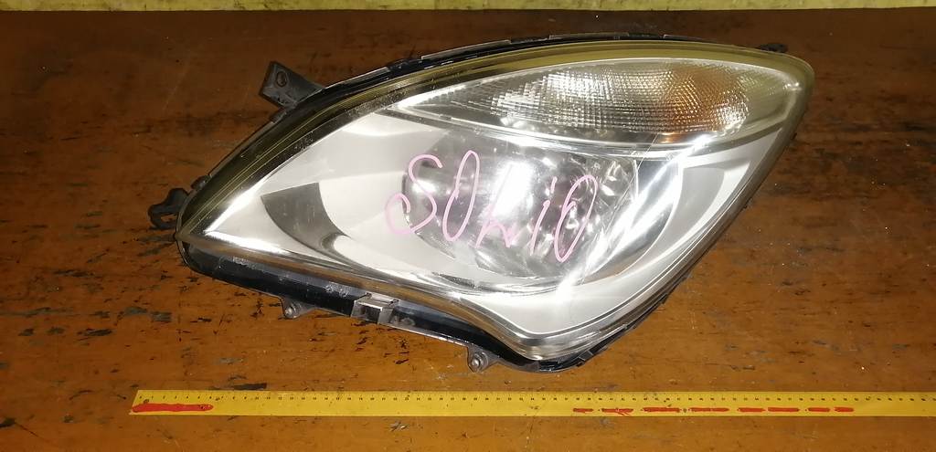 фара Suzuki Solio