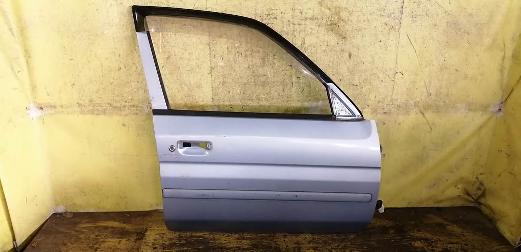 дверь Mazda Demio