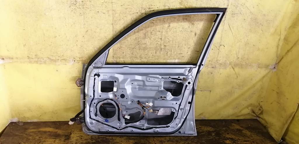 дверь Mazda Demio