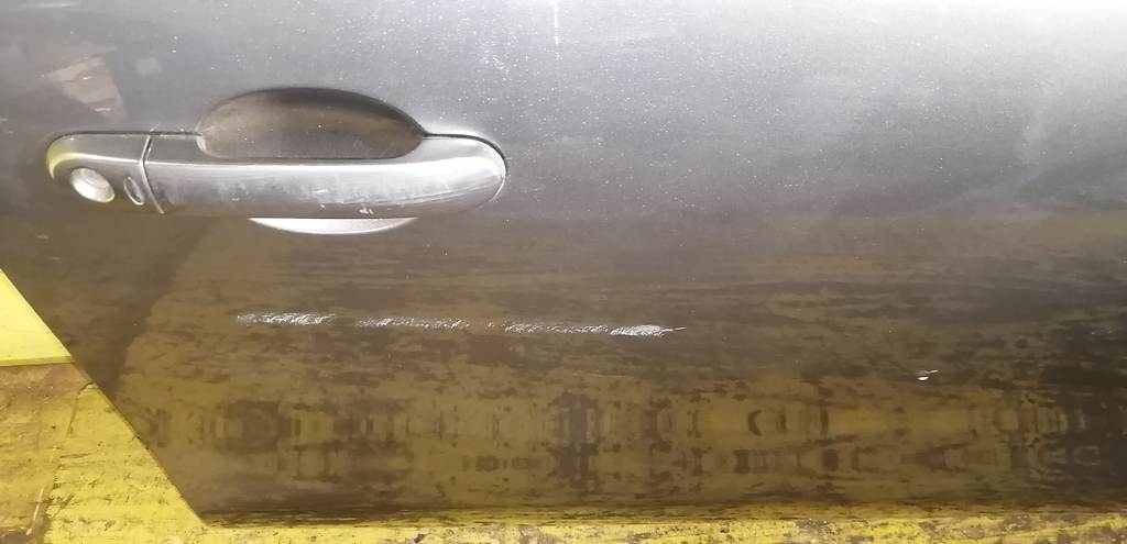 дверь Nissan Note