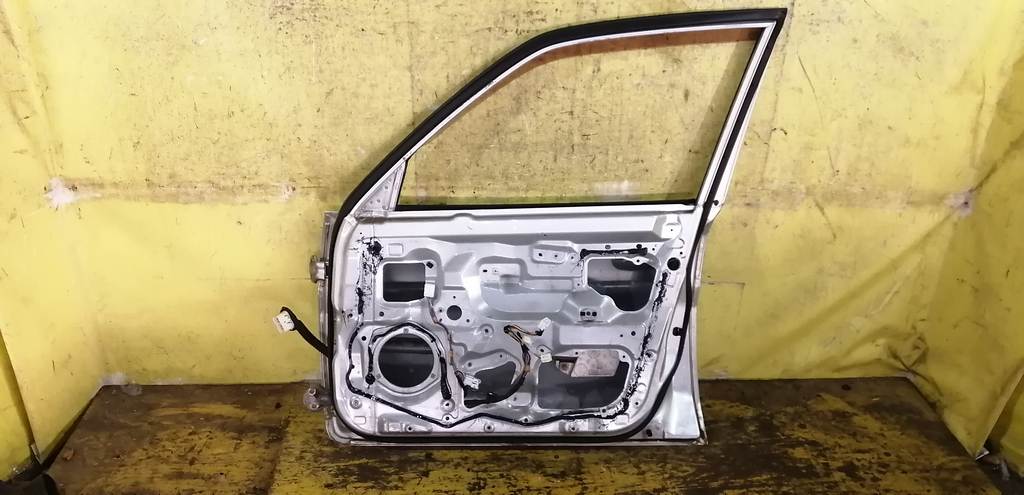 дверь Mazda Demio