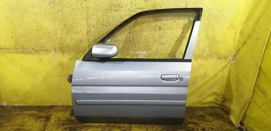 дверь Mazda Demio