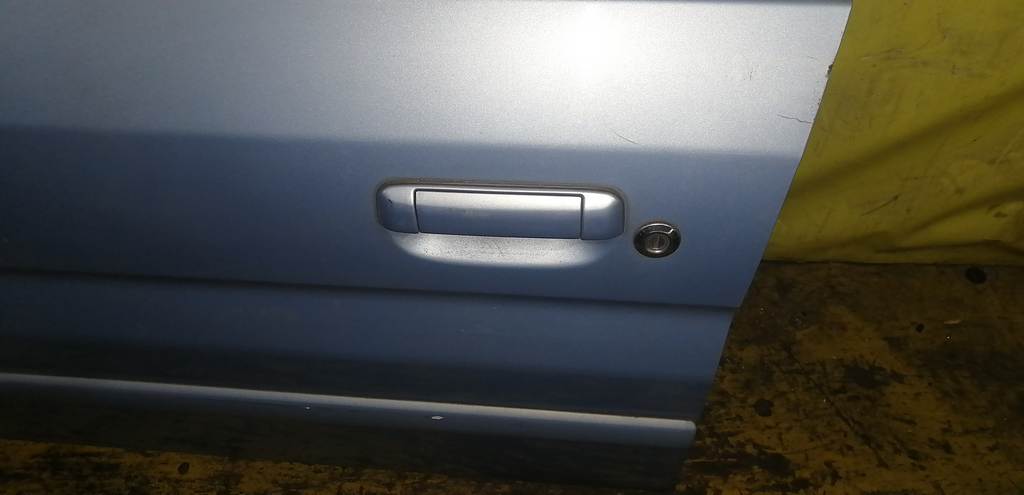 дверь Mazda Demio