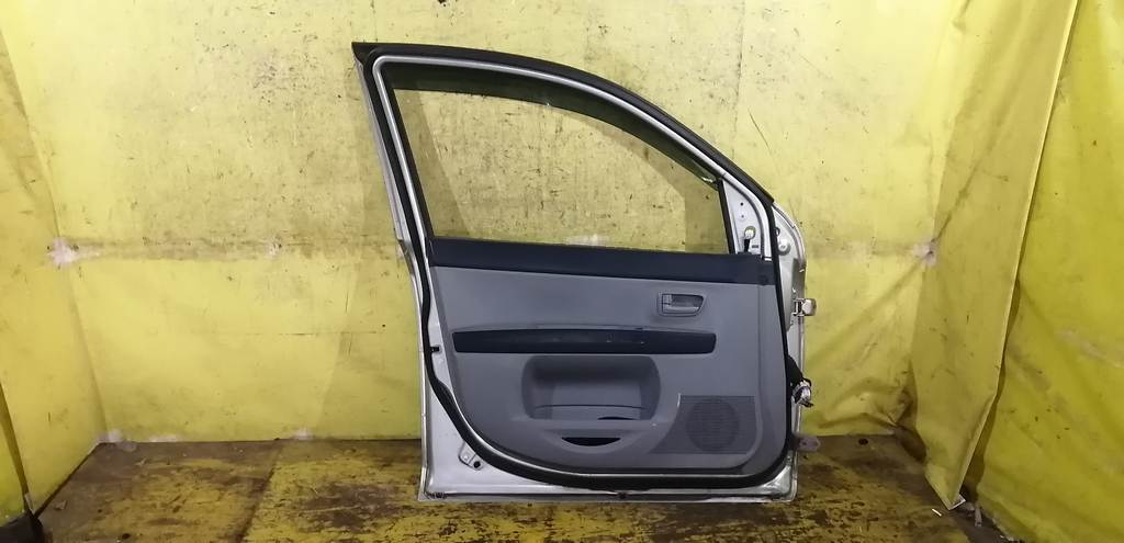 дверь Mazda Demio