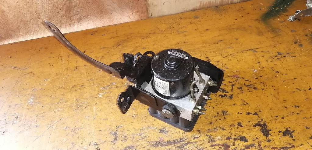 блок abs Mazda Demio