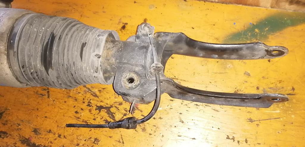 стойка Porsche Cayenne