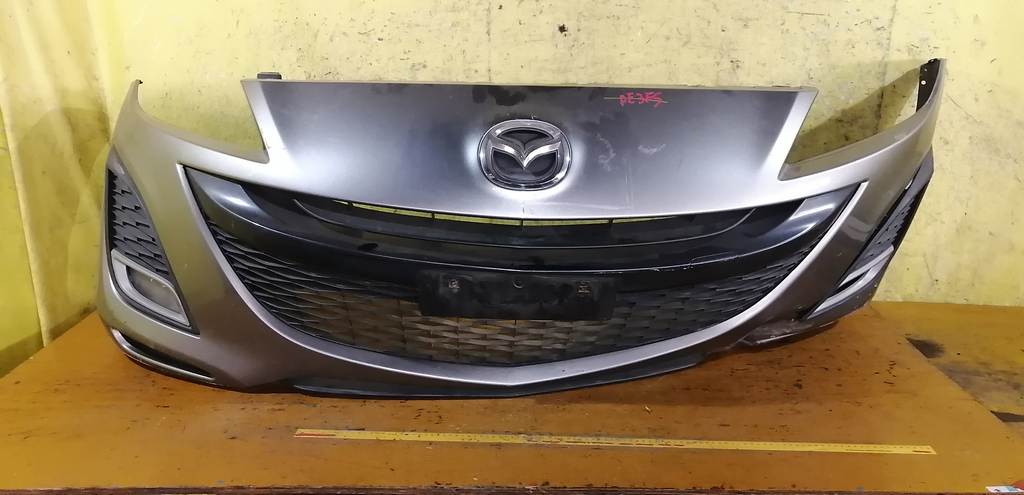 бампер Mazda Axela
