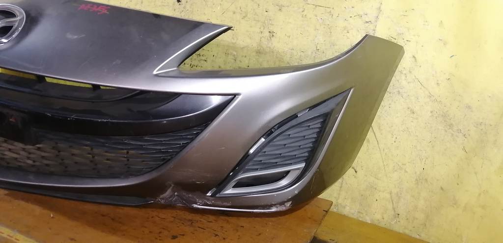 бампер Mazda Axela