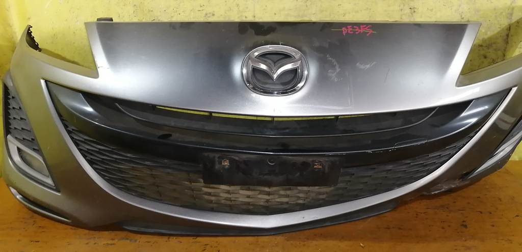 бампер Mazda Axela