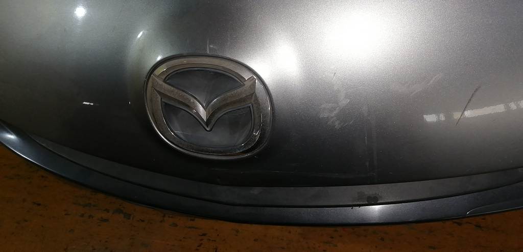 бампер Mazda Axela