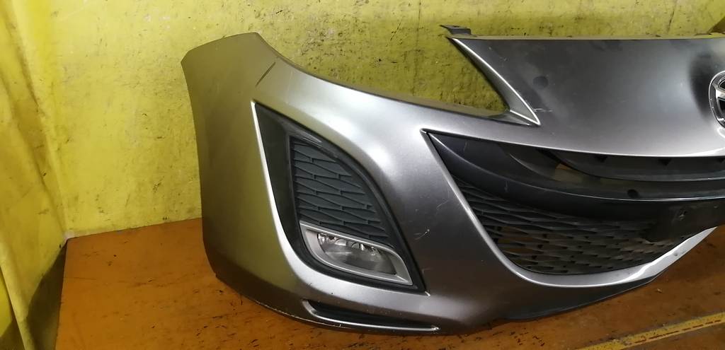 бампер Mazda Axela