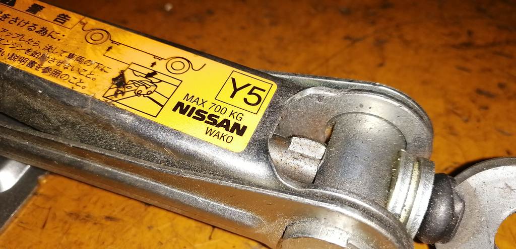 домкрат Nissan Note