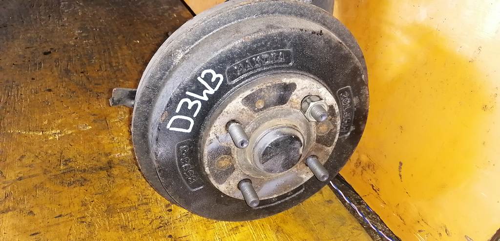 балка со ступицами Mazda Demio
