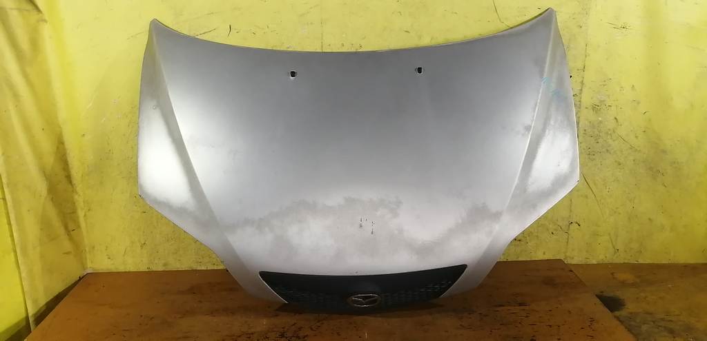 капот Mazda Demio