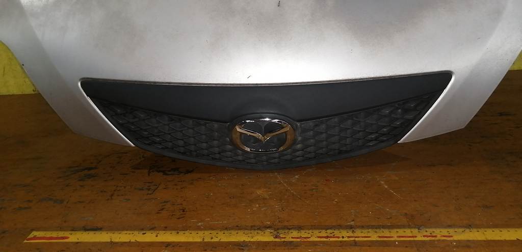 капот Mazda Demio