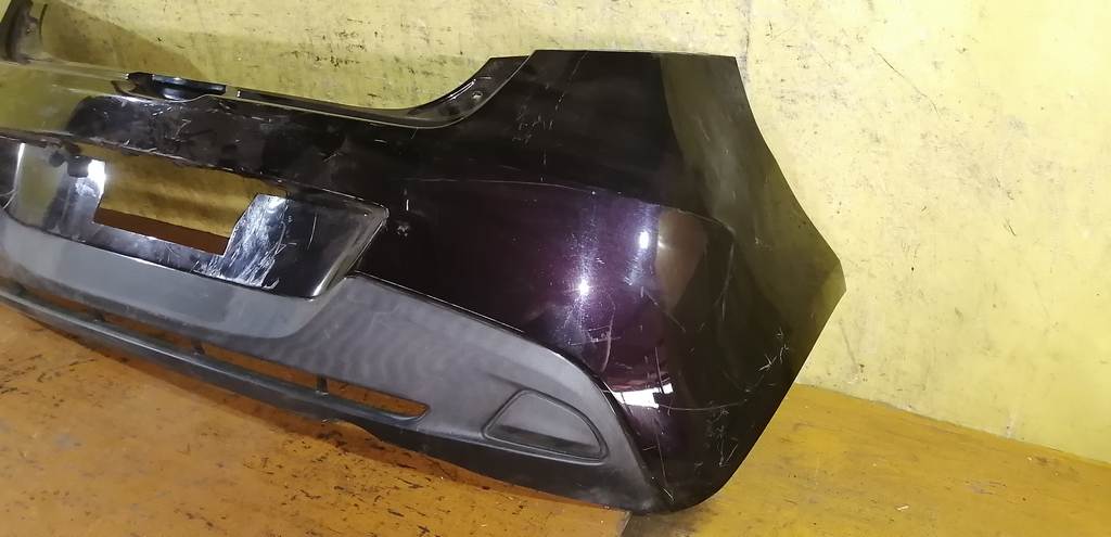 бампер Mazda Demio