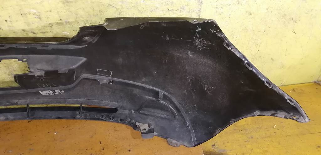 бампер Mazda Demio