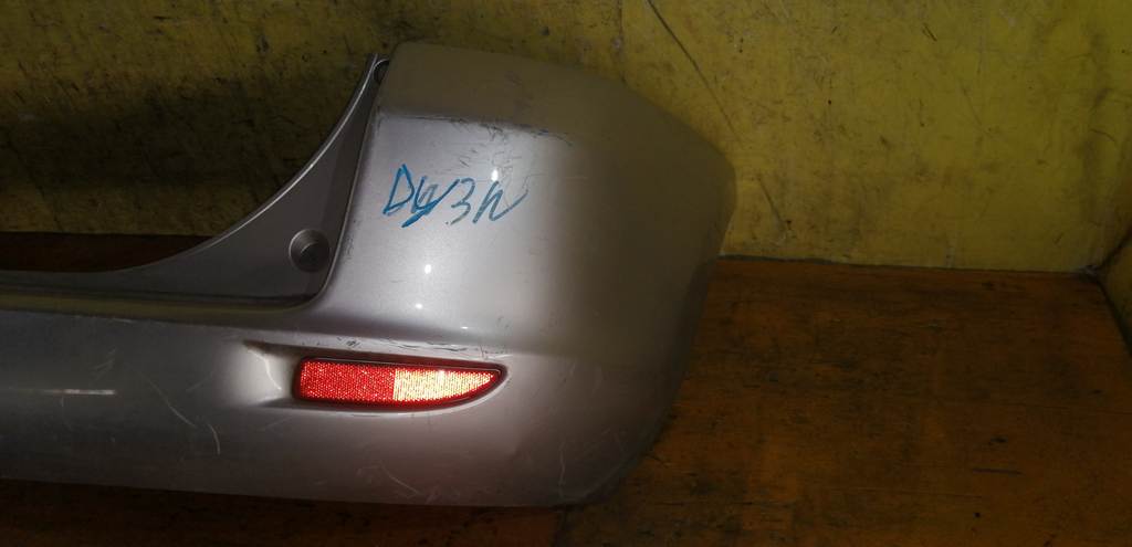 бампер Mazda Demio
