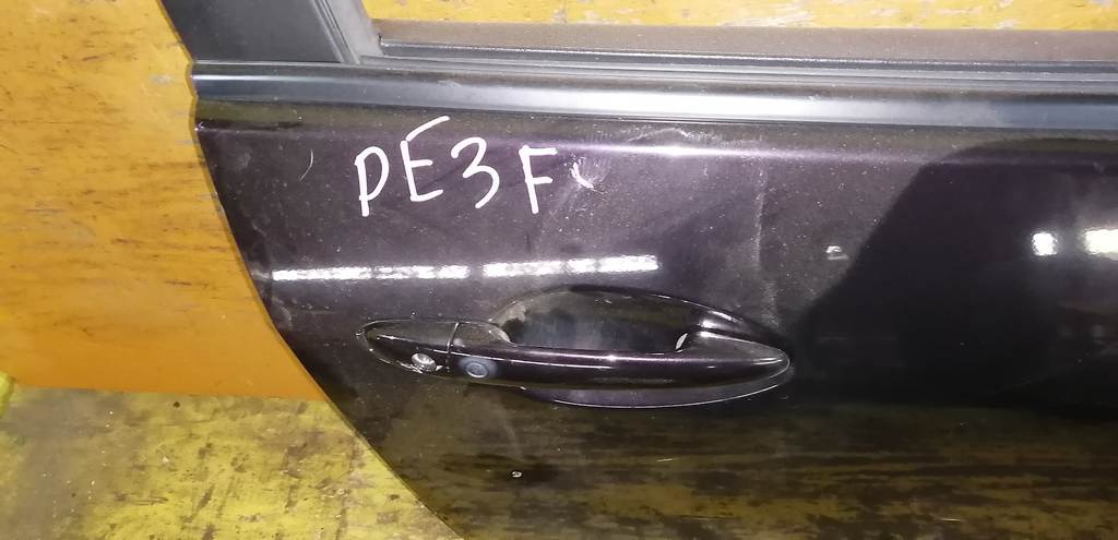 дверь Mazda Demio