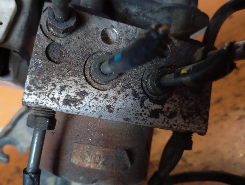 блок abs Mazda Demio
