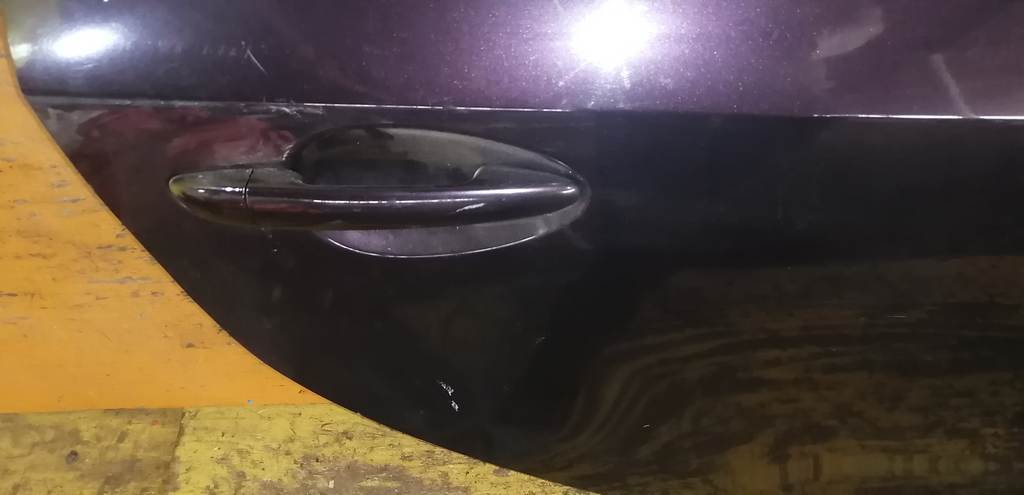 дверь Mazda Demio