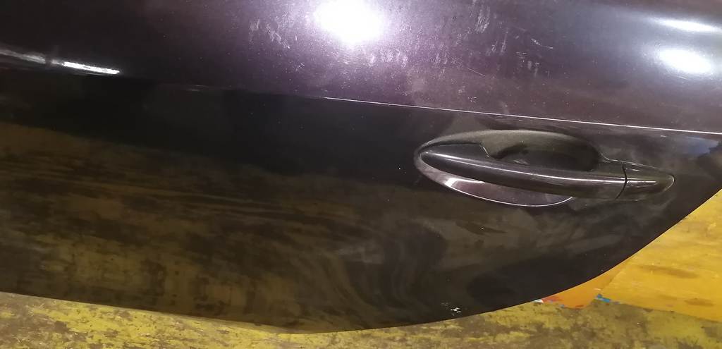 дверь Mazda Demio